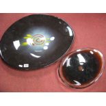 A Studio Glass Oval Shaped Black Bowl, with white balls, yellow streaks, signed on rim, together