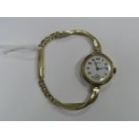 Buren; A 9ct Gold Cased Ladies Wristwatch, the signed dial with black Arabic numerals and seconds