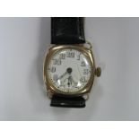 A 9ct Gold Cased Gent's Wristwatch, the white dial with Arabic numerals and seconds subsidiary dial,