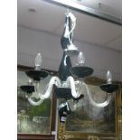 A Sia Black Glass Ceiling Light, with five clear scroll branches.