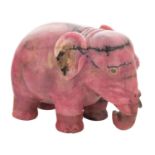 A RUSSIAN RHODONITE MODEL OF AN ELEPHANT, CIRCA 1900