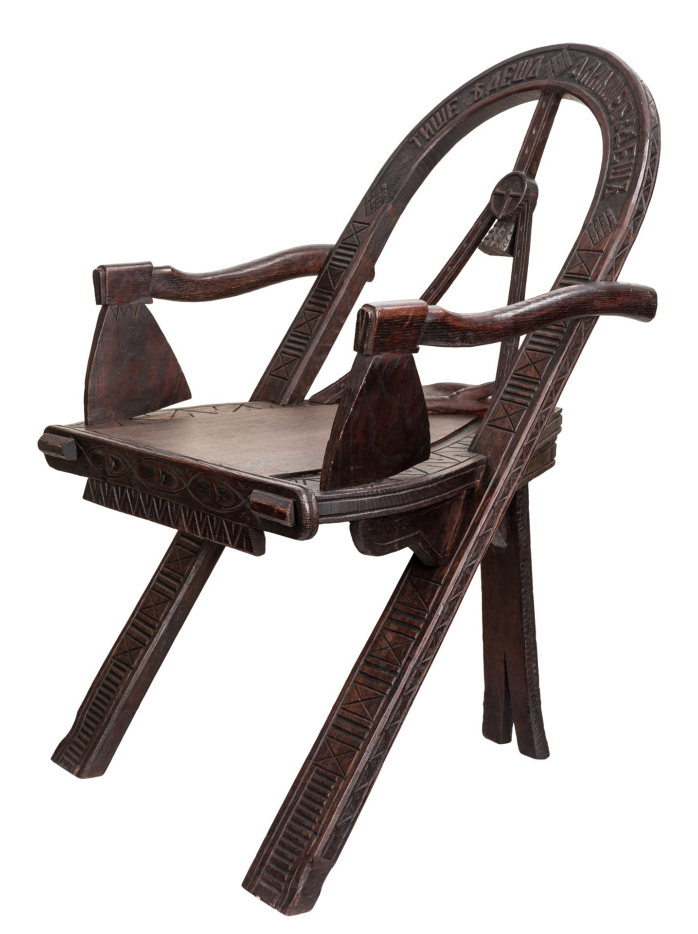 A RUSSIAN CARVED OAK CHAIR AFTER THE DESIGN BY VASILI PETROVICH SHUTOV (RUSSIAN 1826-1887)19TH CENT.