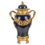 A LOUIS XV/XVI ORMOLU-MOUNTED CHINESE PORCELAIN VASE, WITH LATER SNAKE HANDLES, QIANLONG PERIOD