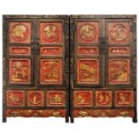 A PAIR OF CHINESE GILTWOOD AND RED LACQUER CABINETS, LATE QING DYNASTY