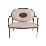 EDWARDIAN PERIOD SATINWOOD AND PAINTED WINDOW SEAT the oval upholstered panelled back, centred by