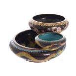 SET OF THREE CHINESE GRADUATED CLOISONNÉ BOWLS each of circular form, two with all over dragon