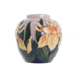 MOORCROFT VASE of bulbous form with raised polychrome leaf and floral decoration 9 cm. high; 9 cm.