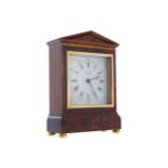 MAHOGANY AND INLAID MANTEL TIMEPIECE29 cm. high; 16 cm. wide; 6.5 cm. deep