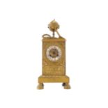 REGENCY PERIOD KNOWLEDGE THEMED ORMOLU MANTLE CLOCKof rectangular form with enamelled Roman