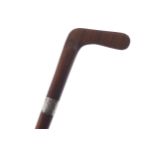 NINETEENTH-CENTURY SUNDAY WALKING STICKin the form of a golf stick with a silver collar