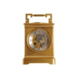 LARGE NINETEENTH-CENTURY FRENCH BRASS CARRIAGE CLOCK circular twin train movement, striking on a