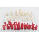 THIRTY-ONE PIECE CARVED CHINESE IVORY CHESS SET