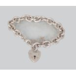 SILVER LINK BRACELET WITH HEART SHAPED LOCK