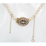 PEARL NECKLACE WITH 9 CT. GOLD PEARL SET CABOCHON CLASP