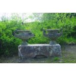 PAIR OF CLASSICAL ITALIANATE STONE URNS