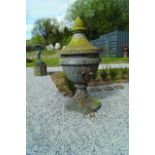 PAIR OF 18TH CENTURY LIMESTONE URNS EACH OF THESE SHAPE SURMOUNTED AND ACORN FINIAL