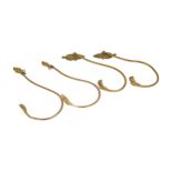 THREE VICTORIAN BRASS COAT HANGERS