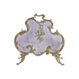 NINETEENTH-CENTURY ARMORIAL SHAPED BRASS FIRE SCREEN