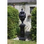 CAST IRON URN ON STAND