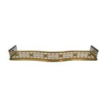 LARGE REGENCY PERIOD SERPENTINE BRASS FENDER