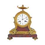 NINETEENTH-CENTURY FRENCH ROUGE ROYALE MARBLE AND ORMOLU MANTLE CLOCK