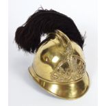 NINETEENTH-CENTURY BRASS CEREMONIAL HELMET