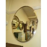 Silvered metal Art Nouveau oval bevel edge mirror