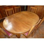 Early 20thC mahogany telescopic oval dining table and 6 chairs