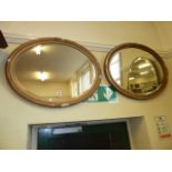 Victorian gilt plaster oval bevel edge mirrors (2)