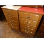 Mid 20thC light oak Formica top 5 drawer chests (2)