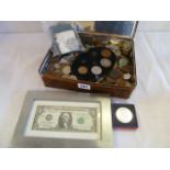 Tin of British and Foreign coins and notes,