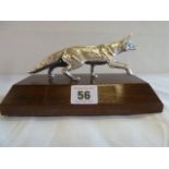 Silver plated running fox figure on wooden plinth