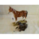 Royal Doulton horse 'Merely a minor' HN 2571 and a Beswick foal