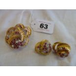 18ct Gold brooch and earrings: brooch set with 10 diamonds and 18 rubies,