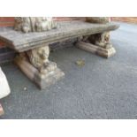 Stone curved garden bench on lion pedestals (70")