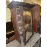 Victorian pine pigeon hole cabinet with oak mirrored door