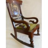 Victorian mahogany scroll arm rocking chair