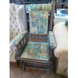 Upholstered mahogany American rocking chair