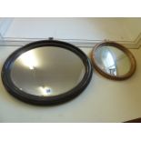 Victorian oval lacquered and circular Gesso mirrors (2)