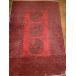 Red ground Persian rug 5' x 3'4"