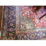 Red ground Persian Keshan carpet medallion design 12' x 9'