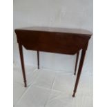 Victorian mahogany Pembroke table on fluted column legs