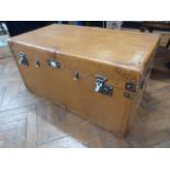 Tan leather covered trunk