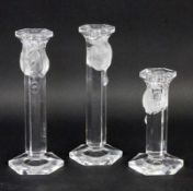 DREI KERZENHALTER Glas. H. max. 21cm THREE CANDLESTICKS Glass. Height maximum 21 cm.