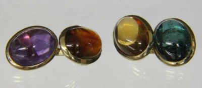 PAAR MANSCHETTENKNÖPFE 585/000 Gelbgold mit Edelsteinen. Brutto ca. 13,14g A PAIR OF CUFFLINKS 585/