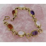 ARMBAND Silber vergoldet mit div. Edelsteinen. L.19cm A BRACELET Gilt silver with various gemstones.