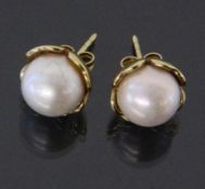 PAAR OHRSTECKER MIT SÜDSEEPERLEN 585/000 Gelbgold. D. ca. 11mm A PAIR OF STUD EARRINGS WITH SOUTH