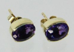 PAAR OHRSTECKER 585/000 Gelbgold mit Amethysten. Brutto ca. 3,5g A PAIR OF STUD EARRINGS 585/000