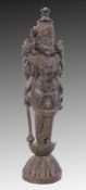 DEVI Indien Stehende Göttin Devi auf Lotussockel mit Attributen. Ebenholz, geschnitzt. H.64cm.