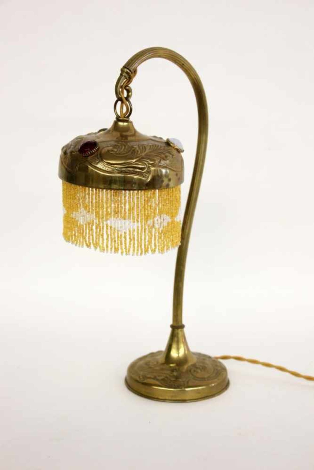 TISCHLAMPE Frankreich, 1920er/30er Jahre Messinggestell mit Reliefdekor, farbigen Glassteinen und